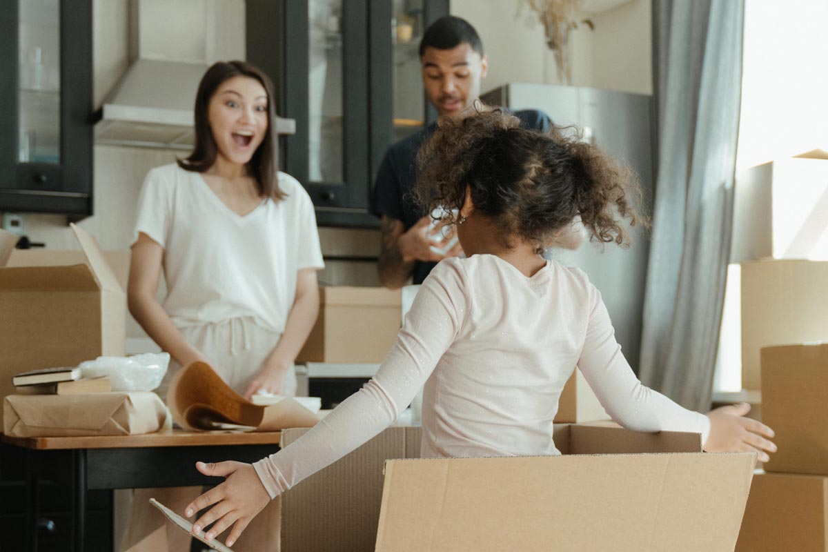 Young family packing to move